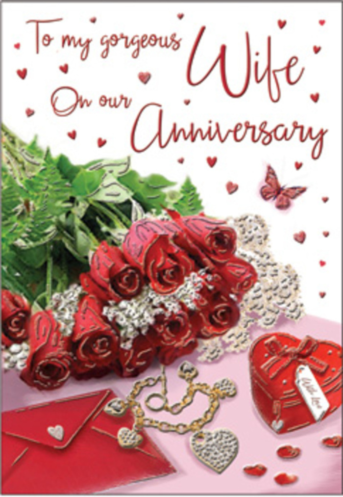 In this romantic anniversary card image, the composition is thoughtfully arranged to evoke the feeling of an intimate celebration in Egham, perhaps after a stroll near the river or an evening by the historic college buildings. At its centre, a small bouquet of red roses is gathered tightly, the blooms full and open, yet still holding the elegant curves of their original buds. Their rich red tones deepen toward the centre of each flower, while the outer petals catch the light in softer highlights, creating a velvety texture you can almost feel. Fresh green foliage cradles the roses, with leaves that overlap and arc gracefully, bringing a sense of natural abundance. Nearby lies a creamy envelope, slightly askew, ready to reveal a heartfelt anniversary note written in flowing script. A heart-shaped box in a bold crimson shade rests close by, hinting at a thoughtful gift tucked safely inside. A delicate piece of jewellery - likely a fine chain with intertwined hearts - trails across the card's surface, its metallic shimmer emphasizing the theme of connection and enduring affection. Scattered around, tiny hearts and small sparkling accents echo the card's romantic message without overwhelming the scene, while a single butterfly motif introduces a moment of gentle whimsy, like a fleeting memory from an earlier anniversary. Soft, even lighting bathes everything in a warm glow, reflecting subtly off the petals, the polished heart box, and the smooth paper. The effect is timeless and tender, an image that perfectly complements an anniversary bouquet delivered by a local Egham florist who understands how much meaning a simple arrangement of roses and a thoughtful card can carry.